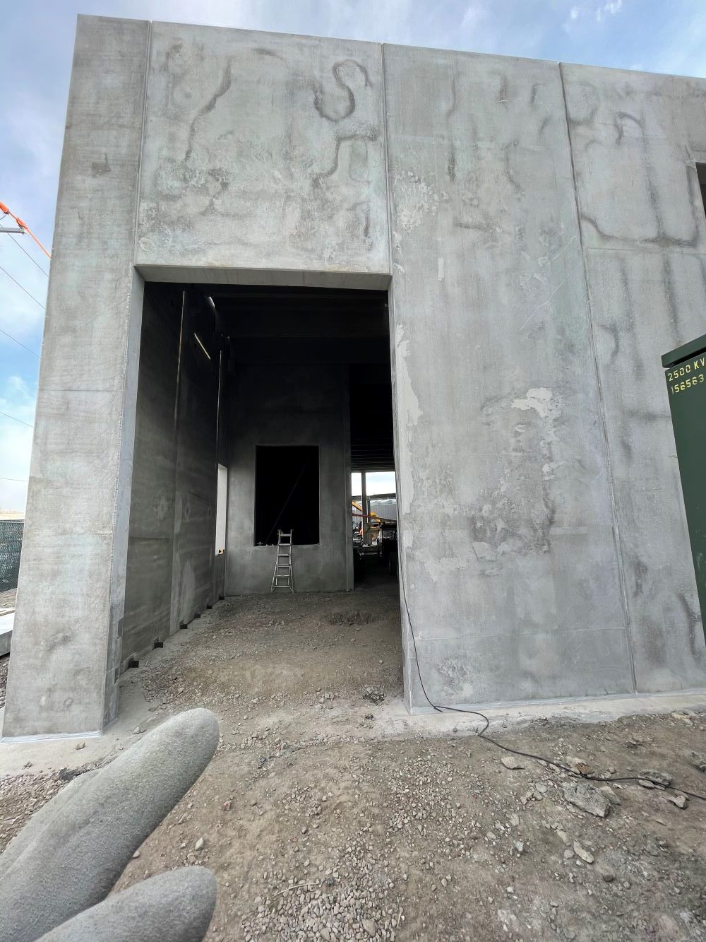 Concrete wall with door opening